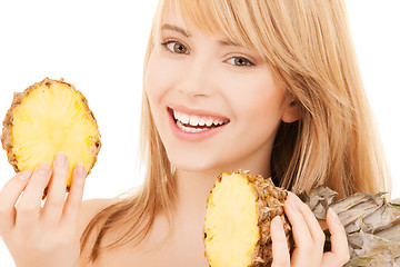 Image showing happy girl with pineapple