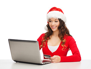 Image showing santa helper woman with laptop and credit card