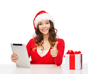 Image showing woman with gift box and tablet pc computer