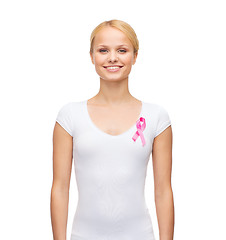 Image showing woman in blank t-shirt with pink cancer ribbon