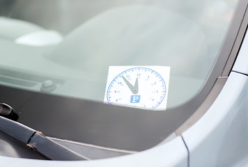 Image showing parking clock on car dashboard