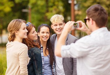 Image showing teenagers taking photo outside