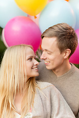 Image showing couple with colorful balloons