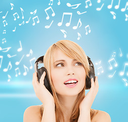 Image showing happy girl with headphones