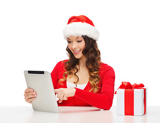 Image showing woman with gift box and tablet pc computer