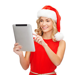 Image showing woman in santa helper hat with tablet pc