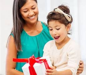 Image showing happy mother and child girl with gift box