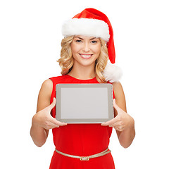 Image showing woman in santa helper hat with tablet pc