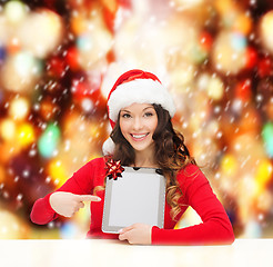 Image showing woman in santa helper hat with tablet pc