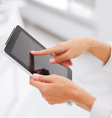 Image showing businesswoman with tablet pc in office