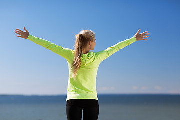 Image showing woman doing sports outdoors