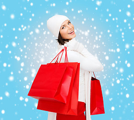 Image showing picture of happy woman with shopping bags