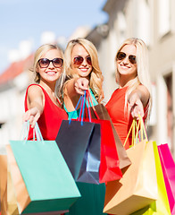 Image showing beautiful women with shopping bags in the ctiy