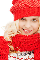 Image showing teenage girl in red hat and scarf