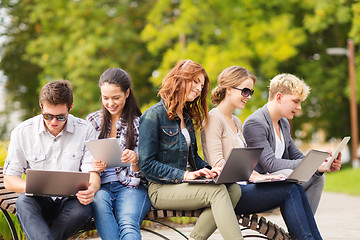 Image showing students or teenagers with laptop computers