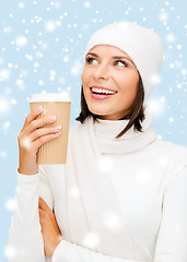 Image showing woman in hat with takeaway tea or coffee cup