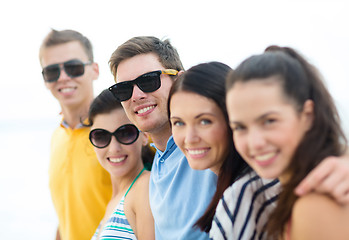 Image showing group of friends having fun on the beach