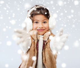 Image showing happy littl girl in winter clothes