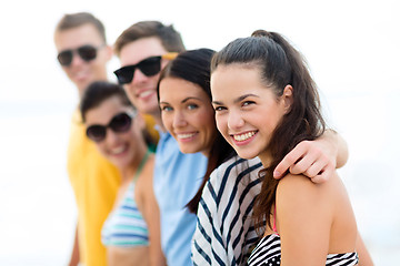 Image showing group of friends having fun on the beach