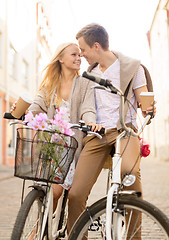 Image showing couple with bicycles in the city