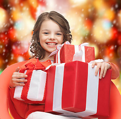 Image showing happy child girl with gift boxes