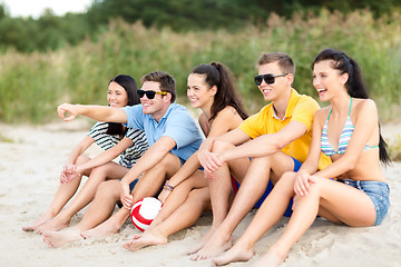 Image showing group of friends having fun on the beach