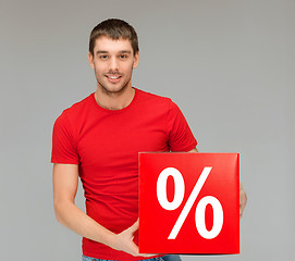 Image showing man in shirt with red percent sale sign