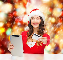 Image showing woman with gift, tablet pc and credit card