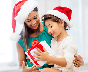 Image showing happy mother and child girl with gift box