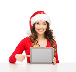 Image showing woman in santa helper hat with tablet pc