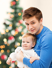 Image showing happy father with adorable baby