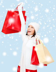 Image showing picture of happy woman with shopping bags