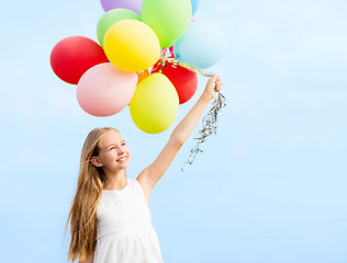 Image showing happy girl with colorful balloons