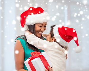 Image showing happy mother and child girl with gift box