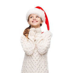 Image showing dreaming girl in santa helper hat