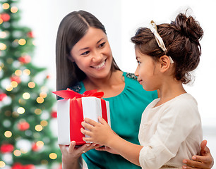 Image showing happy mother and child girl with gift box