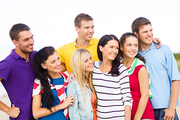 Image showing group of friends having fun on the beach