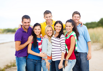 Image showing group of friends having fun on the beach