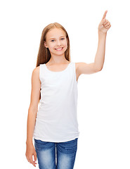 Image showing girl in blank white shirt pointing to something