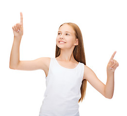 Image showing girl in blank white shirt pointing to something