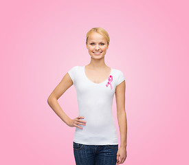 Image showing woman in blank t-shirt with pink cancer ribbon