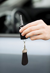 Image showing man with car key outside