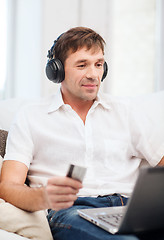 Image showing man with headphones listening to music