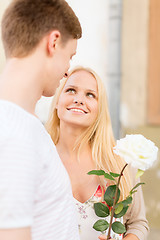 Image showing couple with flowers in the city