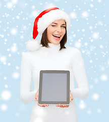 Image showing woman in santa helper hat with tablet pc