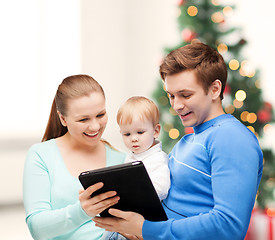 Image showing parents and adorable baby with tablet pc