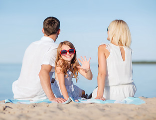 Image showing happy family on the beach