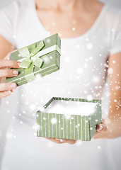 Image showing woman hands with gift box