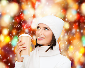 Image showing woman in hat with takeaway tea or coffee cup
