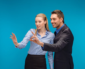 Image showing woman and man working with virtual screen